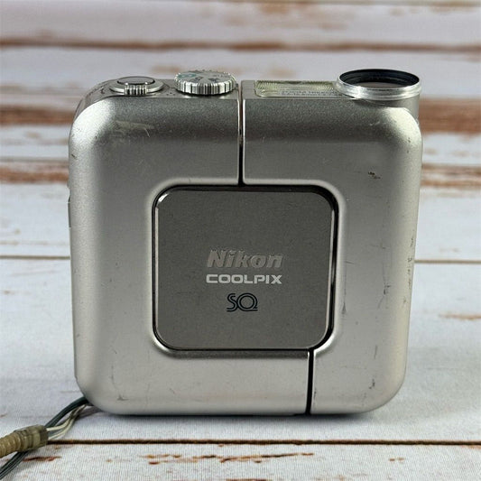 Nikon COOLPIX SQ Silver Digital Compact Camera (Not New) – 4x Zoom & LCD Screen